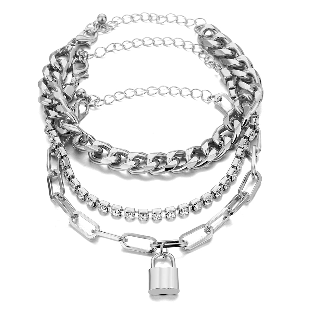 Experience high-quality beauty with our Punk Heavy Metal Crystal Lock Pendant Bracelet Set! Crafted with durable metal and zinc alloy, this eye-catching bracelet is sure to draw attention. It's perfect for the modern woman who loves unique fashion. Enjoy the link chain and special lock pendant for a look that's both timeless and cutting-edge.