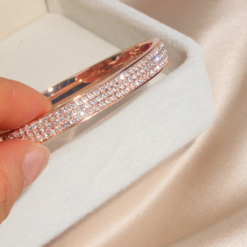 Exquisite classic-style rose gold plating and zinc alloy accents make this crystal cuff bangle a timeless wardrobe essential for women. Its fashionable design promises to remain a beloved favorite for years to come!