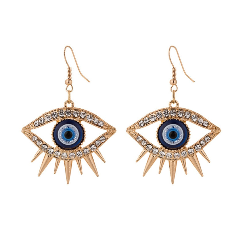 Fashion-forward and flashy, these Geometric Rhinestone Evil Eye Statement Earrings offer beauty and style. Perfect for any look, these stunning earrings are crafted for women, making sure you dazzle wherever you go!
