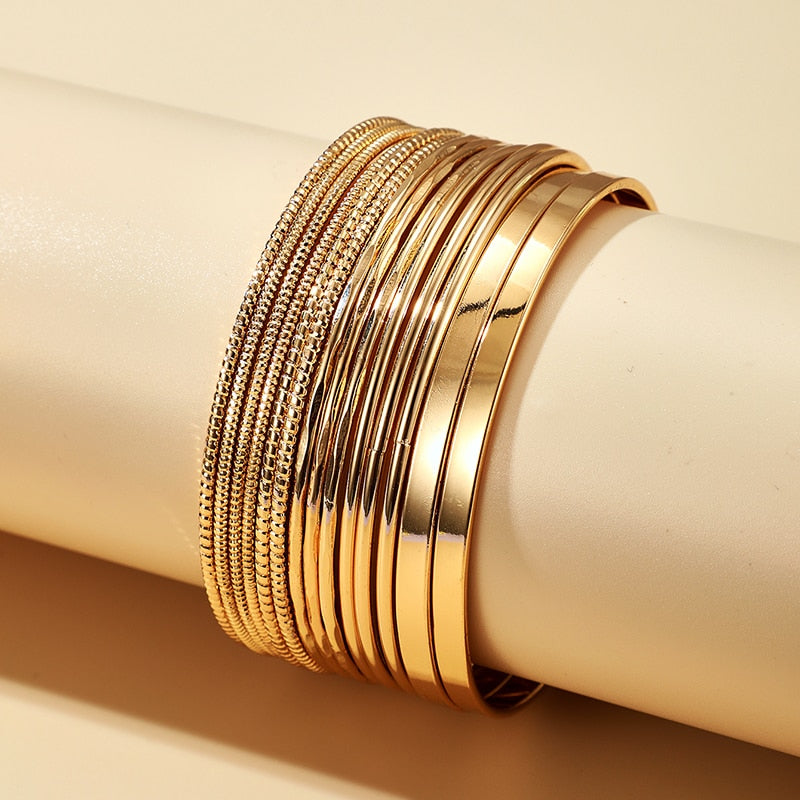 Fit for fashion lovers, these bracelets are crafted from zinc alloy with a luxurious golden hue. They're perfect for any woman's look, and with their universal compatibility, they make for a great addition to any ensemble!