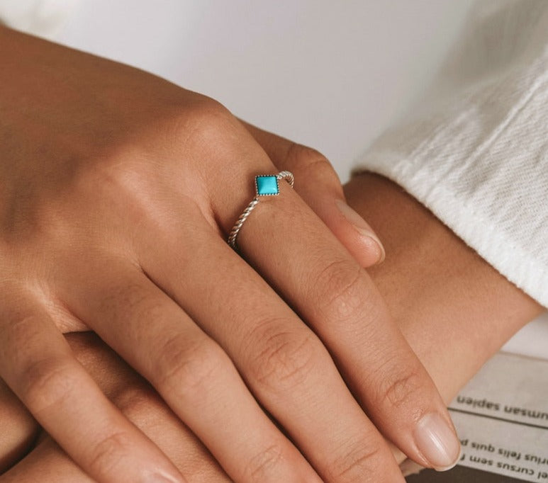 Strikingly gorgeous, this 925 sterling silver women's ring features a two-tone design and a dazzling square gemstone of genuine zircon! A timeless symbol of romance, it's a beautiful choice for any occasion and its 1.5 gram weight makes it an ideal accessory for any wardrobe. Crafted with the finest quality, this ring is sure to become a treasured heirloom that lasts for generations!