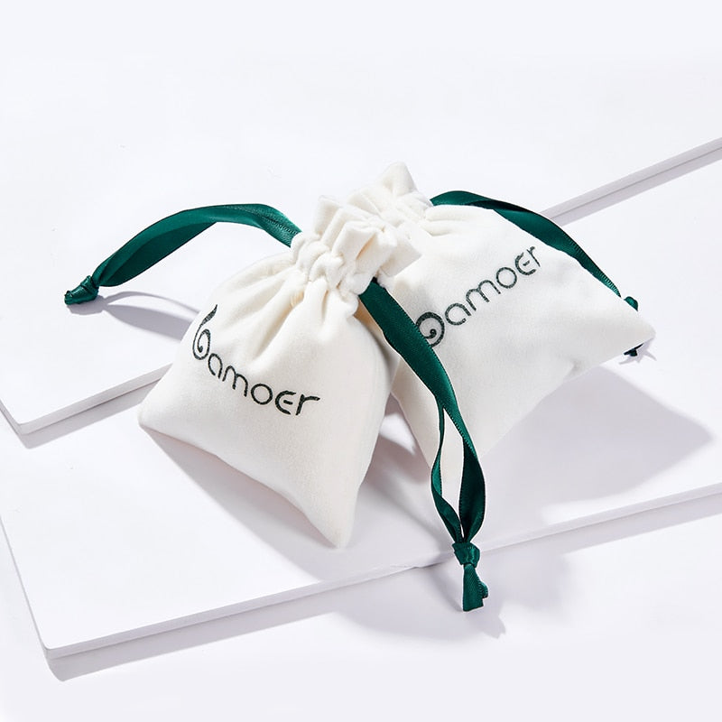 Strikingly gorgeous, this 925 sterling silver women's ring features a two-tone design and a dazzling square gemstone of genuine zircon! A timeless symbol of romance, it's a beautiful choice for any occasion and its 1.5 gram weight makes it an ideal accessory for any wardrobe. Crafted with the finest quality, this ring is sure to become a treasured heirloom that lasts for generations!