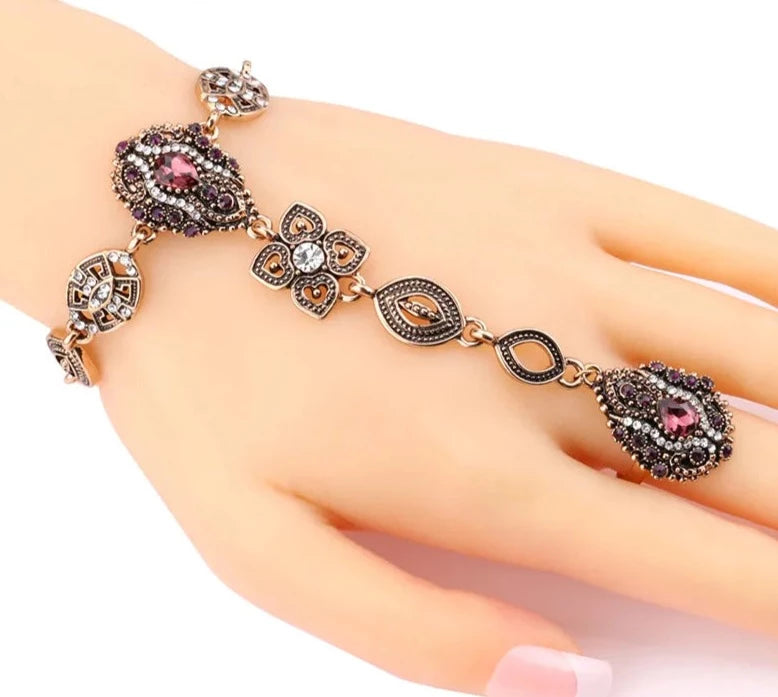 The exquisite vintage jewelry sets featuring fashion crystal flower designs, including unique bracelets and rings for women. These luxurious pieces are crafted in gold color, showcasing the elegance of Turkey's finest jewelry.
