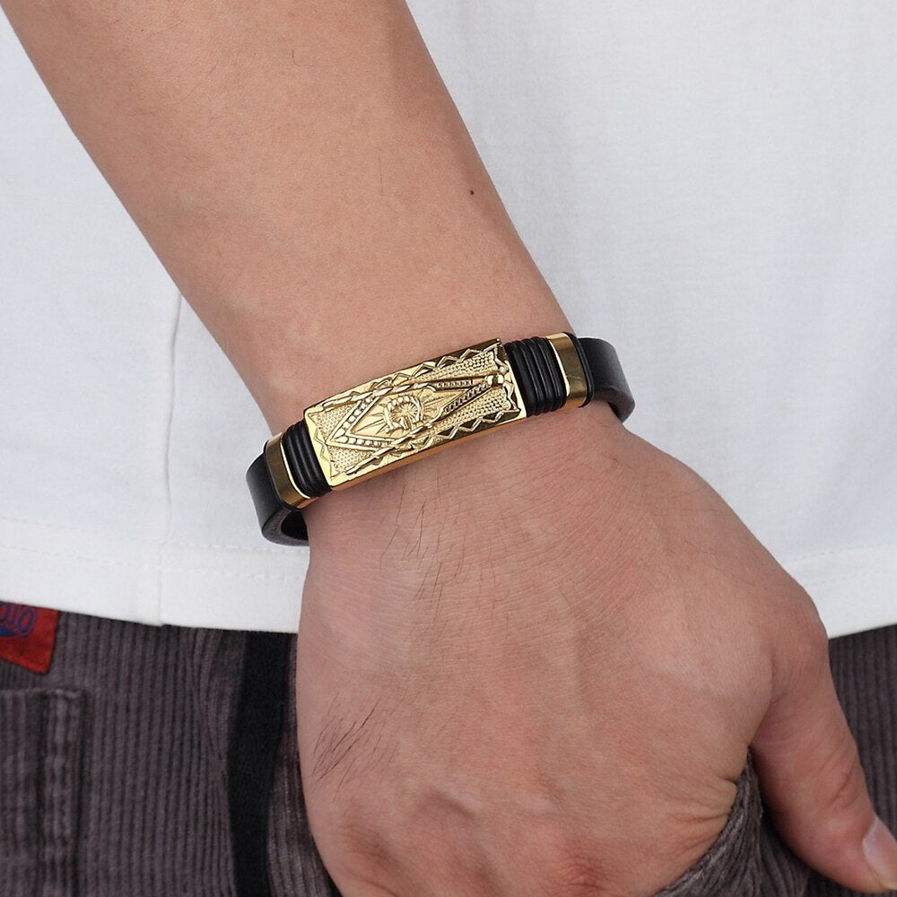 Experience the timeless style of the Leather Bracelet Gold Color Totem with its Stainless Steel &amp; Genuine Leather construction. This exquisite men's bracelet features an easy-hook clasp &amp; Genuine Leather chain. Impressive and fashionable, it is sure to elevate any outfit.