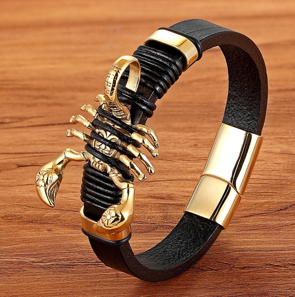 Experience the timeless style of the Leather Bracelet Gold Color Totem with its Stainless Steel &amp; Genuine Leather construction. This exquisite men's bracelet features an easy-hook clasp &amp; Genuine Leather chain. Impressive and fashionable, it is sure to elevate any outfit.