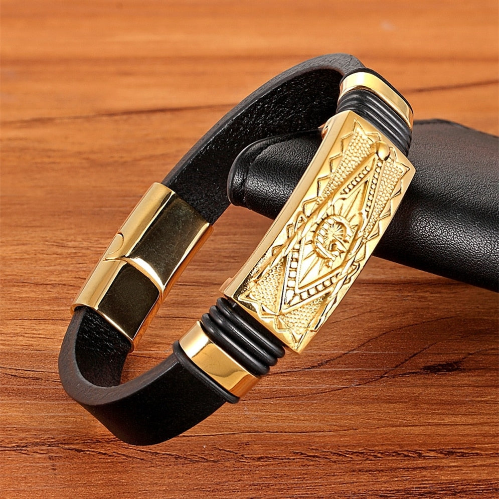 Experience the timeless style of the Leather Bracelet Gold Color Totem with its Stainless Steel &amp; Genuine Leather construction. This exquisite men's bracelet features an easy-hook clasp &amp; Genuine Leather chain. Impressive and fashionable, it is sure to elevate any outfit.