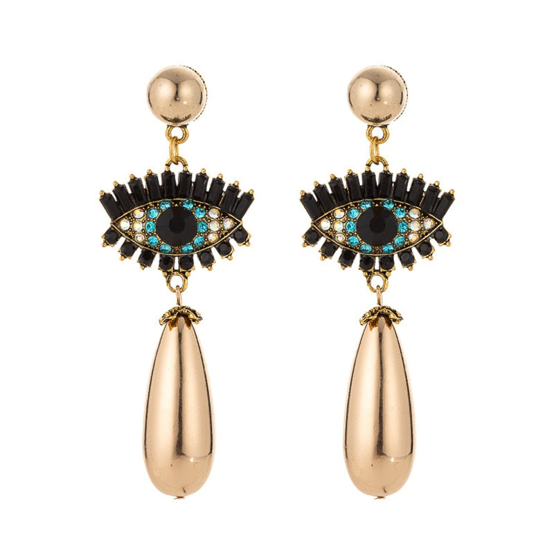 Fashion-forward and flashy, these Geometric Rhinestone Evil Eye Statement Earrings offer beauty and style. Perfect for any look, these stunning earrings are crafted for women, making sure you dazzle wherever you go!