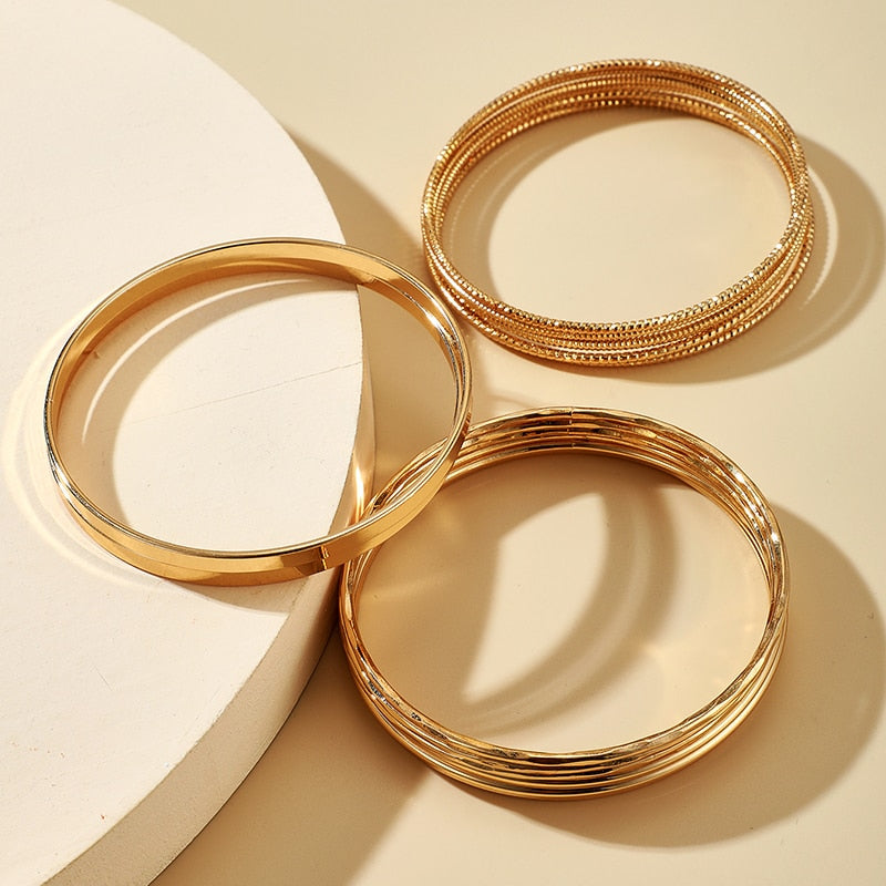Fit for fashion lovers, these bracelets are crafted from zinc alloy with a luxurious golden hue. They're perfect for any woman's look, and with their universal compatibility, they make for a great addition to any ensemble!