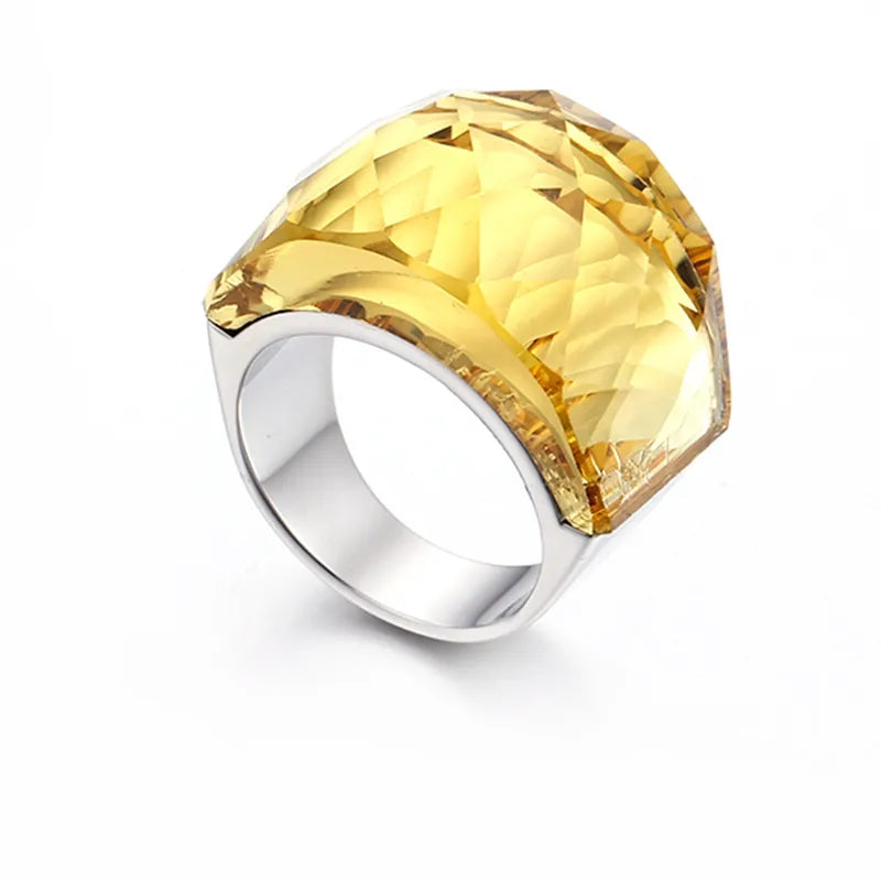 Elevate your style with our exquisite collection of Bohemia Crystal Women Wedding Rings. Crafted with precision, these rings feature a stunning blend of gold and stainless steel, creating a timeless and elegant look. Adorned with colorful stones, they add a touch of glamour to any occasion, be it a party or an engagement. Indulge in the beauty of these rings and make a statement with our luxurious and captivating jewelry.