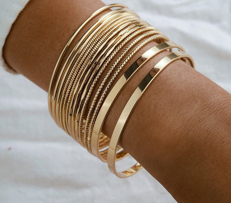 Fit for fashion lovers, these bracelets are crafted from zinc alloy with a luxurious golden hue. They're perfect for any woman's look, and with their universal compatibility, they make for a great addition to any ensemble!