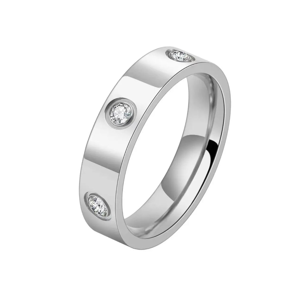 This luxurious piece of jewelry is a stainless steel love ring designed for both men and women. With its classic cross design and rose gold color, it exudes elegance and sophistication. Adorned with CZ crystals, it adds a touch of sparkle and glamour. Perfect as a wedding gift or a symbol of love, this ring is a true statement piece.