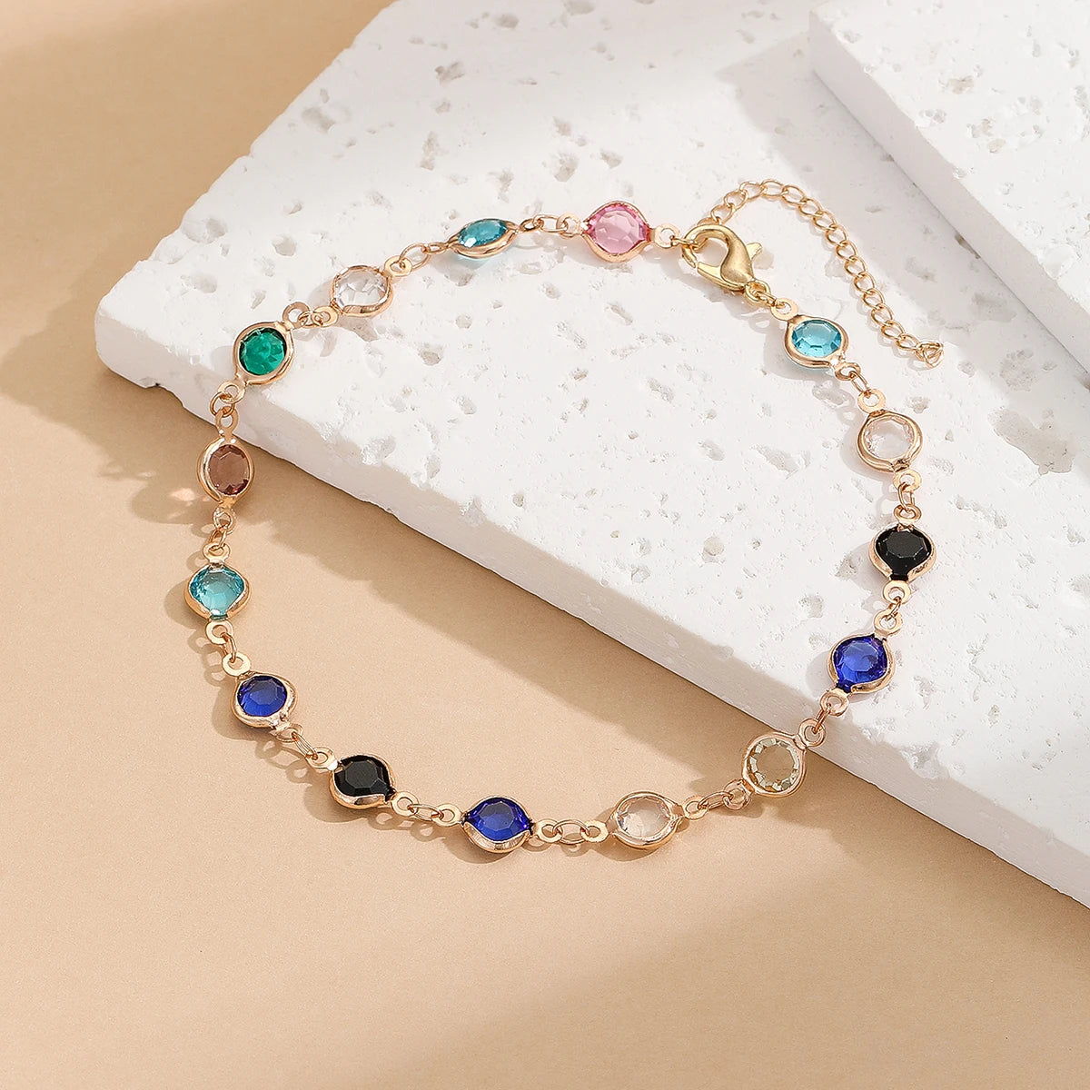 Surprise her with a stunning birthday gift - a minimalist, adjustable foot accessory made of colorful zircon and stainless steel. These anklets are perfect for women and girls, adding a touch of elegance to any outfit.