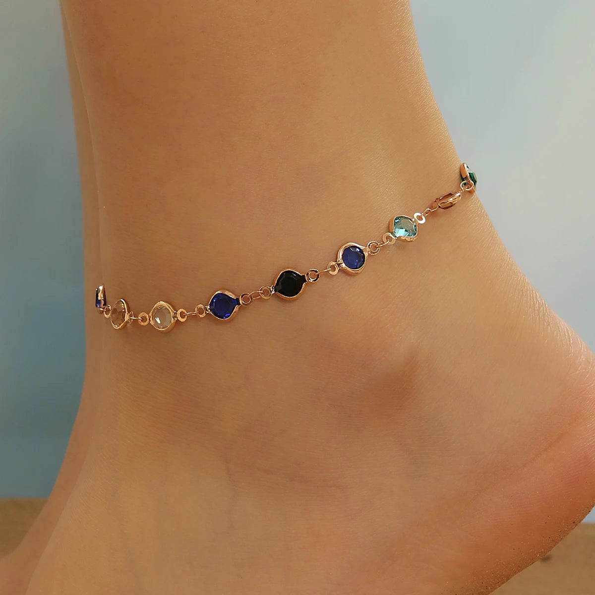 Surprise her with a stunning birthday gift - a minimalist, adjustable foot accessory made of colorful zircon and stainless steel. These anklets are perfect for women and girls, adding a touch of elegance to any outfit.