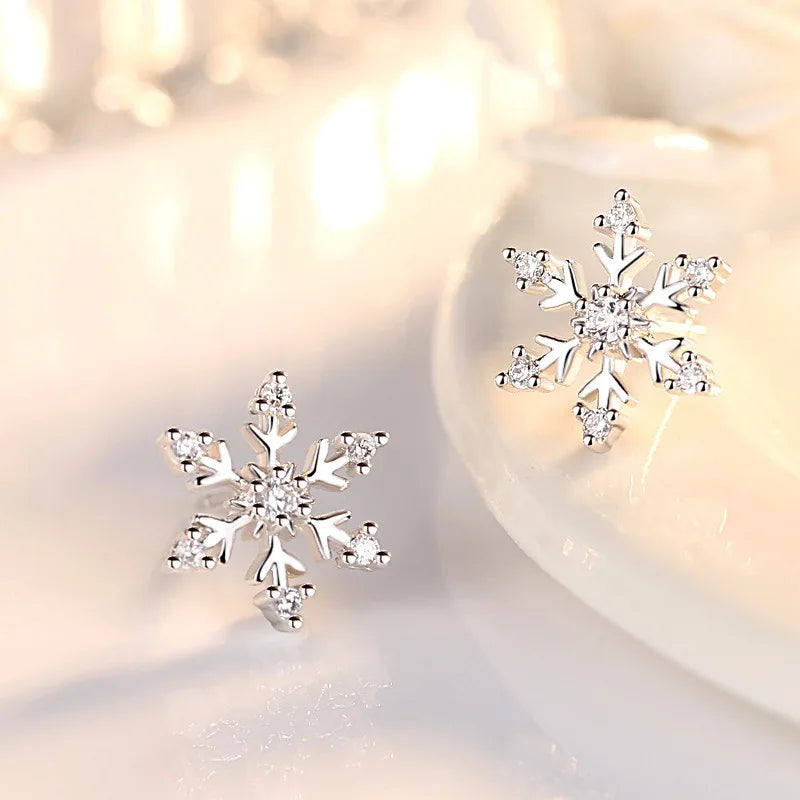 Experience the latest Christmas fashion with our exquisite 2023 collection of earrings. These elegant earrings feature a combination of zircon, pearls, and snowflake designs, adding a touch of sophistication and charm to your look. Perfect for those who appreciate a princess-like style, these earrings are sure to make a statement.
