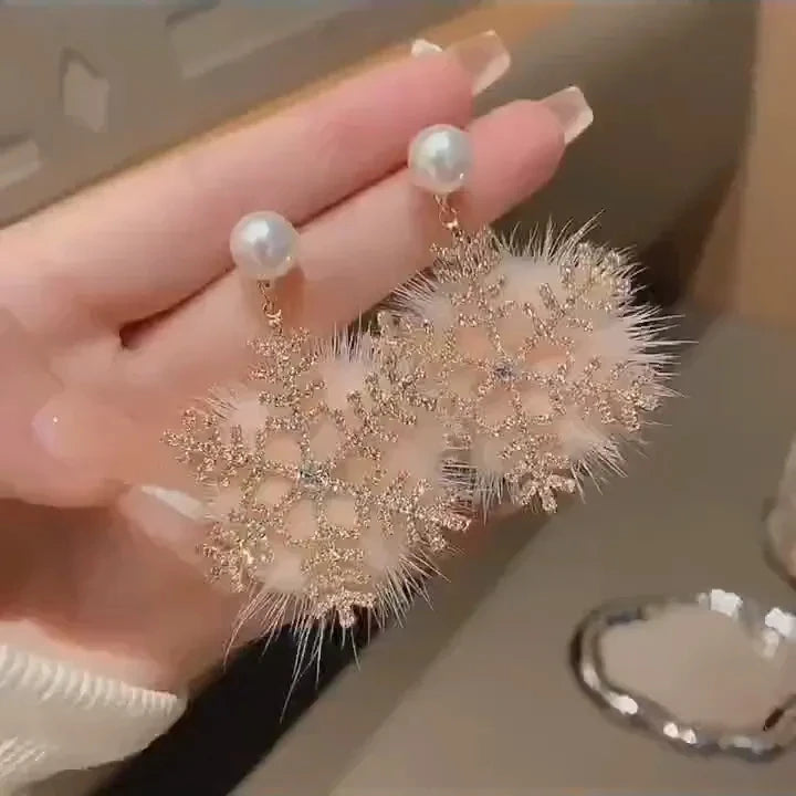 Experience the latest Christmas fashion with our exquisite 2023 collection of earrings. These elegant earrings feature a combination of zircon, pearls, and snowflake designs, adding a touch of sophistication and charm to your look. Perfect for those who appreciate a princess-like style, these earrings are sure to make a statement.