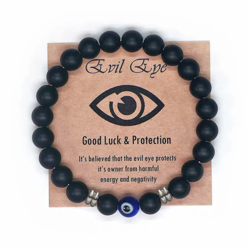 The captivating Tiger Eye Beaded Bracelet, a unisex Turkish Amulet that offers protection against the evil eye. This exquisite piece of spiritual jewelry is designed for both men and women, featuring natural Tiger Eye beads and a striking blue Evil Eye charm.