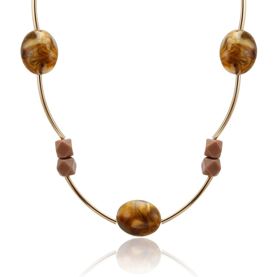 Charm your neck with these stunning geometric wooden blocks necklaces &amp; pendants! Crafted from Metal, they make a unique fashion statement. Experience the rope chain’s captivating look to ignite your ensemble!