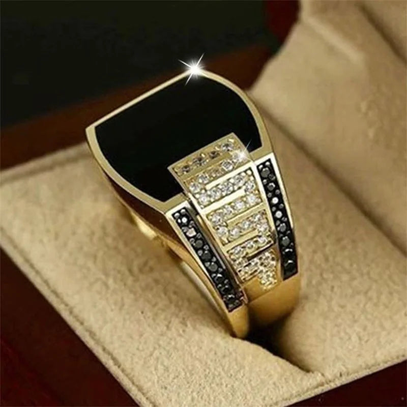 This luxurious piece of jewelry is a classic men's ring featuring a gold-colored metal band with a black stone and zircon inlay. Perfect for engagements, weddings, or adding a touch of punk style to any outfit.