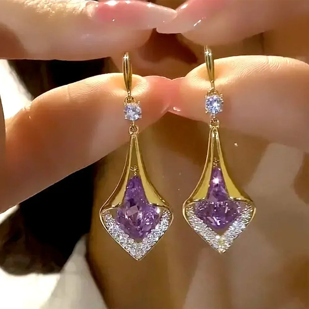 The latest fashion trend of these stunning Zircon Leaf Earrings, featuring a unique and elegant design. Perfect for weddings, parties, or as a premium gift for women who appreciate exquisite jewelry.