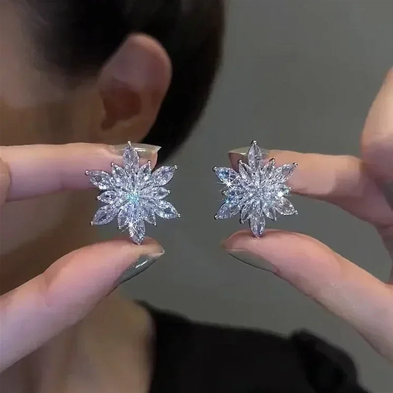 The latest fashion trend of these stunning Zircon Leaf Earrings, featuring a unique and elegant design. Perfect for weddings, parties, or as a premium gift for women who appreciate exquisite jewelry.