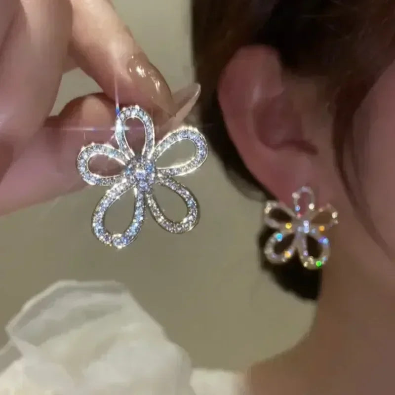 The latest fashion trend of these stunning Zircon Leaf Earrings, featuring a unique and elegant design. Perfect for weddings, parties, or as a premium gift for women who appreciate exquisite jewelry.