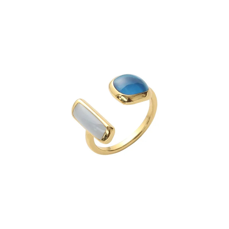 The latest French-inspired jewelry trend of 2021 with this elegant New Retro Square Blue Oil Dripping Ring. Designed to exude a fashionable temperament, this simple opening ring is a must-have for women who appreciate timeless style and sophistication. Elevate your jewelry collection with this stunning piece.