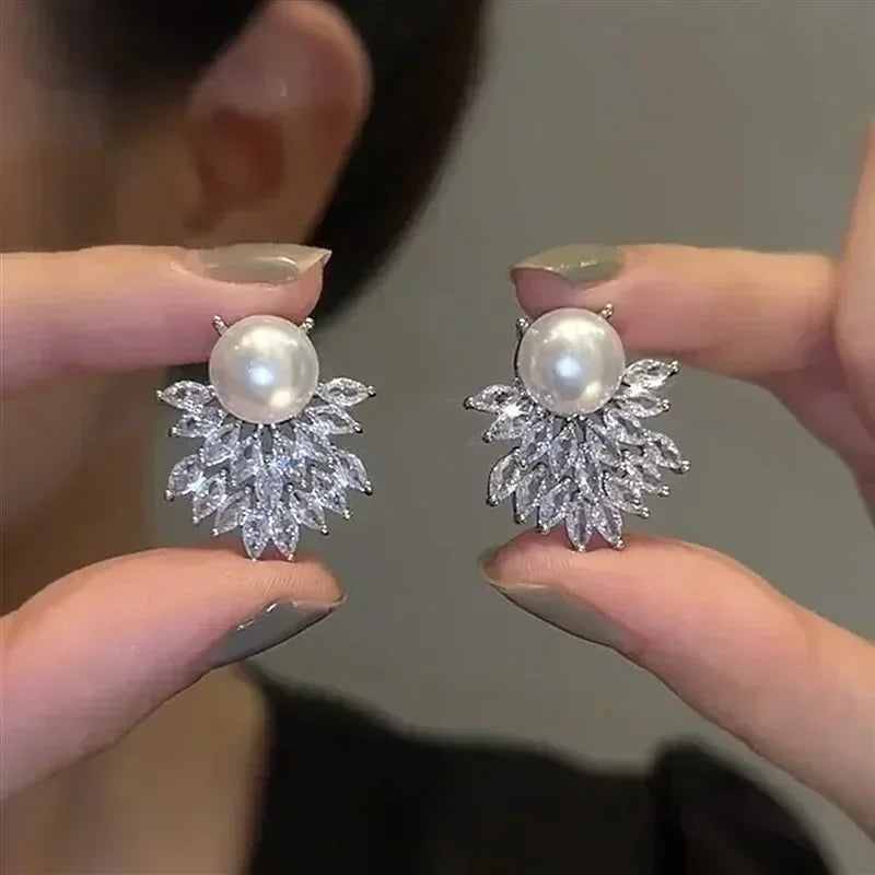 The latest fashion trend of these stunning Zircon Leaf Earrings, featuring a unique and elegant design. Perfect for weddings, parties, or as a premium gift for women who appreciate exquisite jewelry.