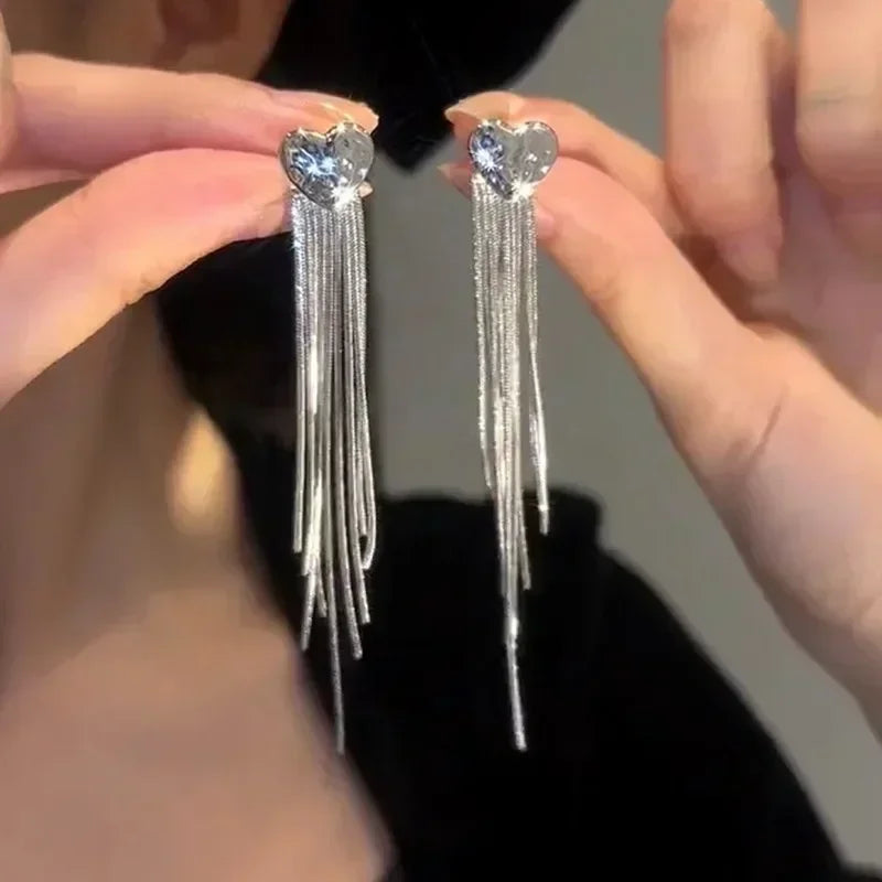 The latest fashion trend of these stunning Zircon Leaf Earrings, featuring a unique and elegant design. Perfect for weddings, parties, or as a premium gift for women who appreciate exquisite jewelry.