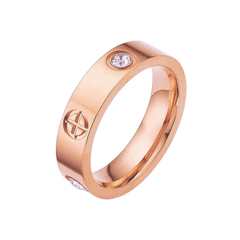 This luxurious piece of jewelry is a stainless steel love ring designed for both men and women. With its classic cross design and rose gold color, it exudes elegance and sophistication. Adorned with CZ crystals, it adds a touch of sparkle and glamour. Perfect as a wedding gift or a symbol of love, this ring is a true statement piece.