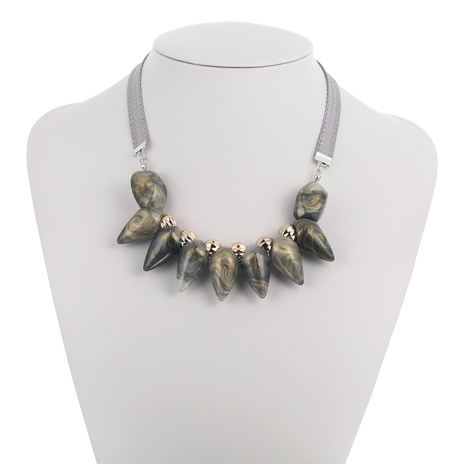 Charm your neck with these stunning geometric wooden blocks necklaces &amp; pendants! Crafted from Metal, they make a unique fashion statement. Experience the rope chain’s captivating look to ignite your ensemble!