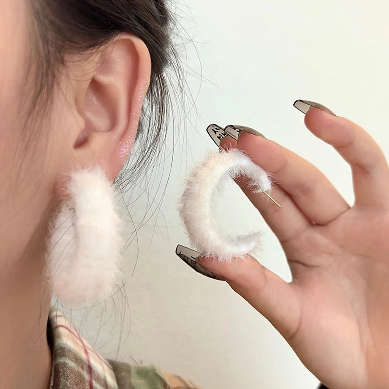 Experience the latest Christmas fashion with our exquisite 2023 collection of earrings. These elegant earrings feature a combination of zircon, pearls, and snowflake designs, adding a touch of sophistication and charm to your look. Perfect for those who appreciate a princess-like style, these earrings are sure to make a statement.