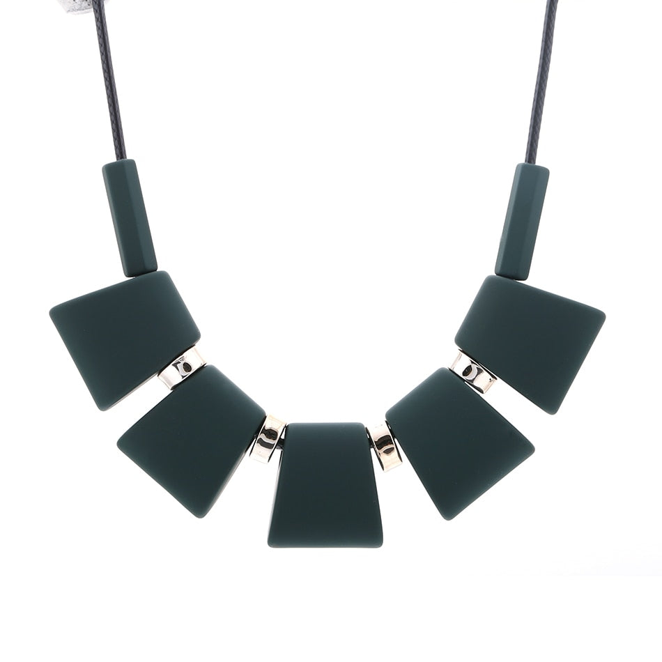 Charm your neck with these stunning geometric wooden blocks necklaces &amp; pendants! Crafted from Metal, they make a unique fashion statement. Experience the rope chain’s captivating look to ignite your ensemble!
