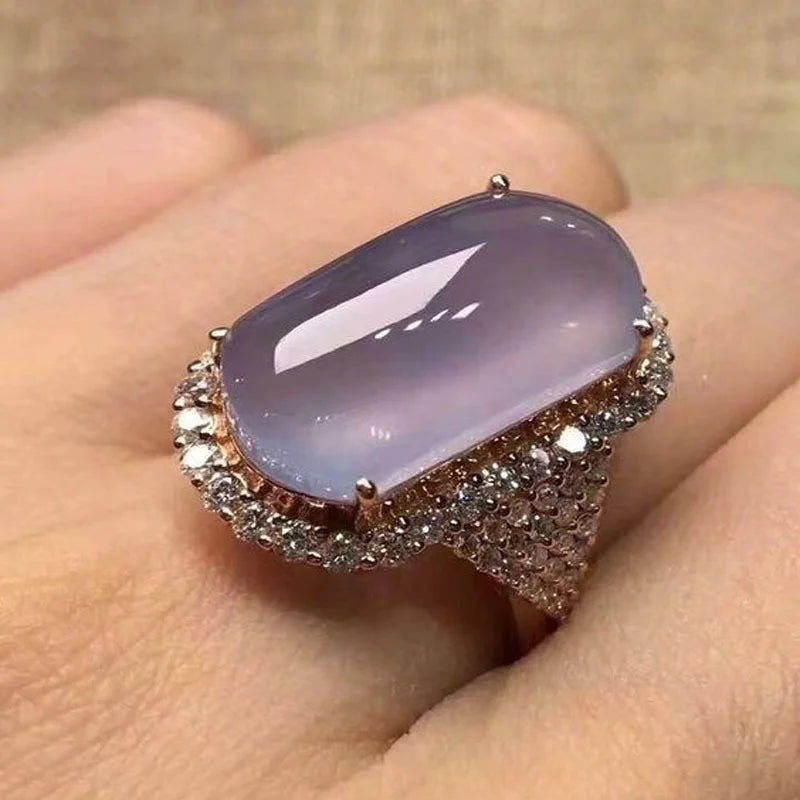 The elegance of our exquisite silver-colored engagement and wedding rings for women, adorned with luxury rectangle light purple zircon stones. This fashion jewelry is designed to add a touch of sophistication to any outfit.
