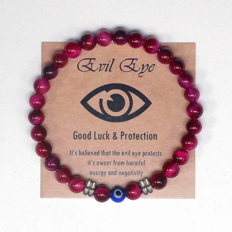 The captivating Tiger Eye Beaded Bracelet, a unisex Turkish Amulet that offers protection against the evil eye. This exquisite piece of spiritual jewelry is designed for both men and women, featuring natural Tiger Eye beads and a striking blue Evil Eye charm.
