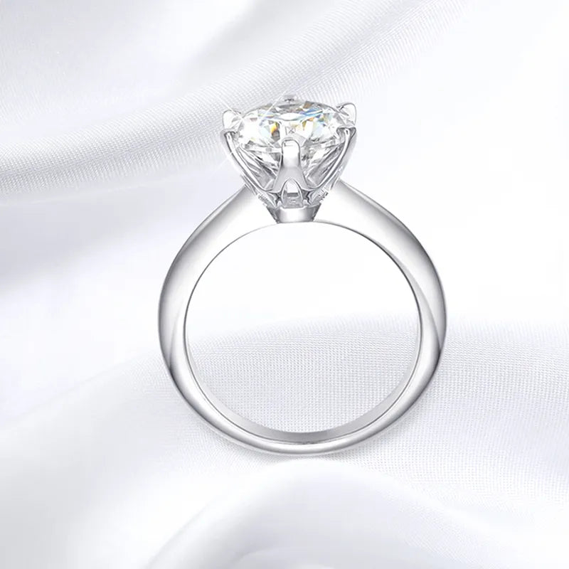 This exquisite 1-5CT VVS1 Lab Diamond Solitaire Ring is a stunning piece of jewelry designed for women. It is perfect for engagements, promises, and weddings, adding a touch of elegance and beauty to any occasion.