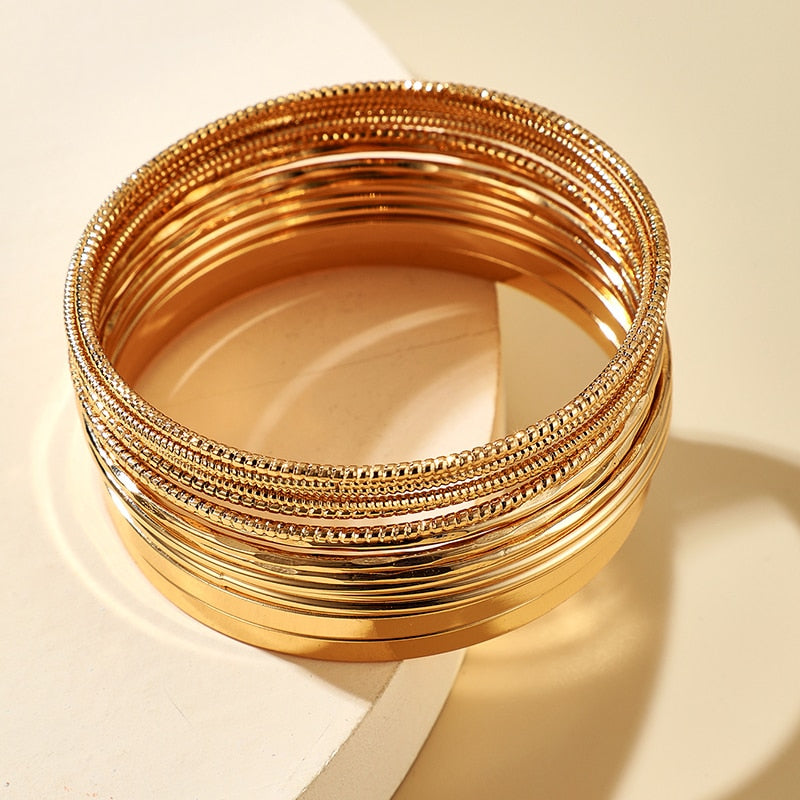 Fit for fashion lovers, these bracelets are crafted from zinc alloy with a luxurious golden hue. They're perfect for any woman's look, and with their universal compatibility, they make for a great addition to any ensemble!